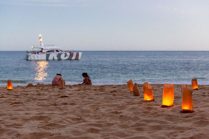 Albufeira: 6-Hour Sunset Dinner Catamaran Cruise with Open Bar - The Armação de Pêra beach dinner: BBQ, bar basics, and evening entertainment