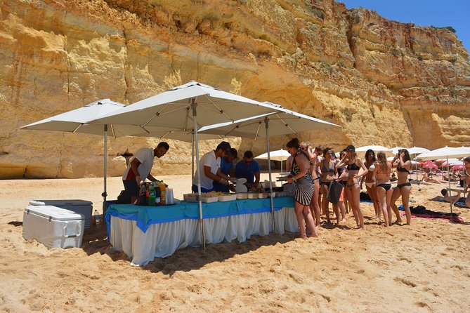 Albufeira Beach BBQ with Caves and Coastline Cruise with Open Bar - Watersports and Beach Games: Paddleboarding Without the Rental Hassle