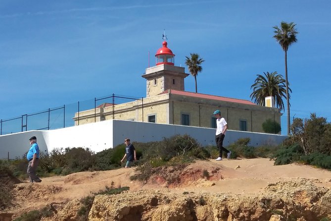 Discover Sagres & Lagos & Portimao ( Full Day Private Van Tour ) - Praia da Marinha: Clear Water, Big Awards, Photo-Proof Cliffs