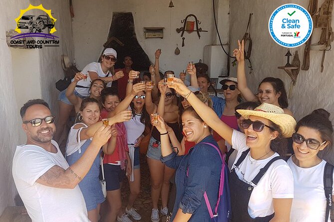 Half Day Tour with Jeep Safari in the Algarve Mountains - Alte viewpoint touches: the Portugal flag on the mountain and Pico Alto views
