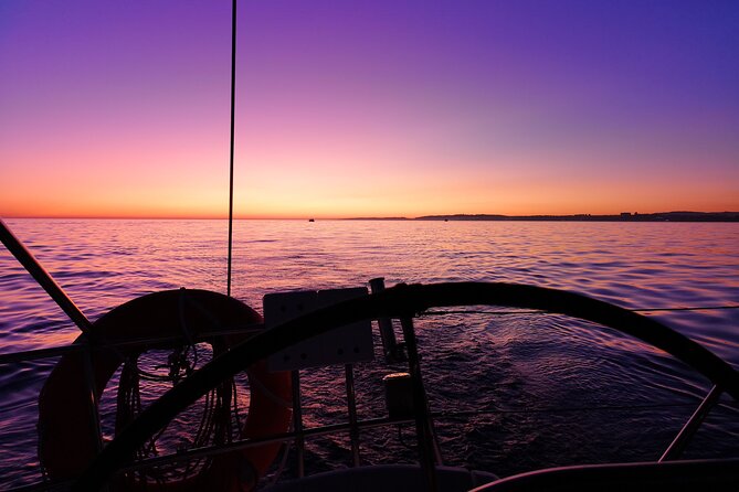 Sunset Tour on a Luxury Sailing Yacht from Vilamoura - A tiny sea-only beach stop with clay on one side and rock on the other
